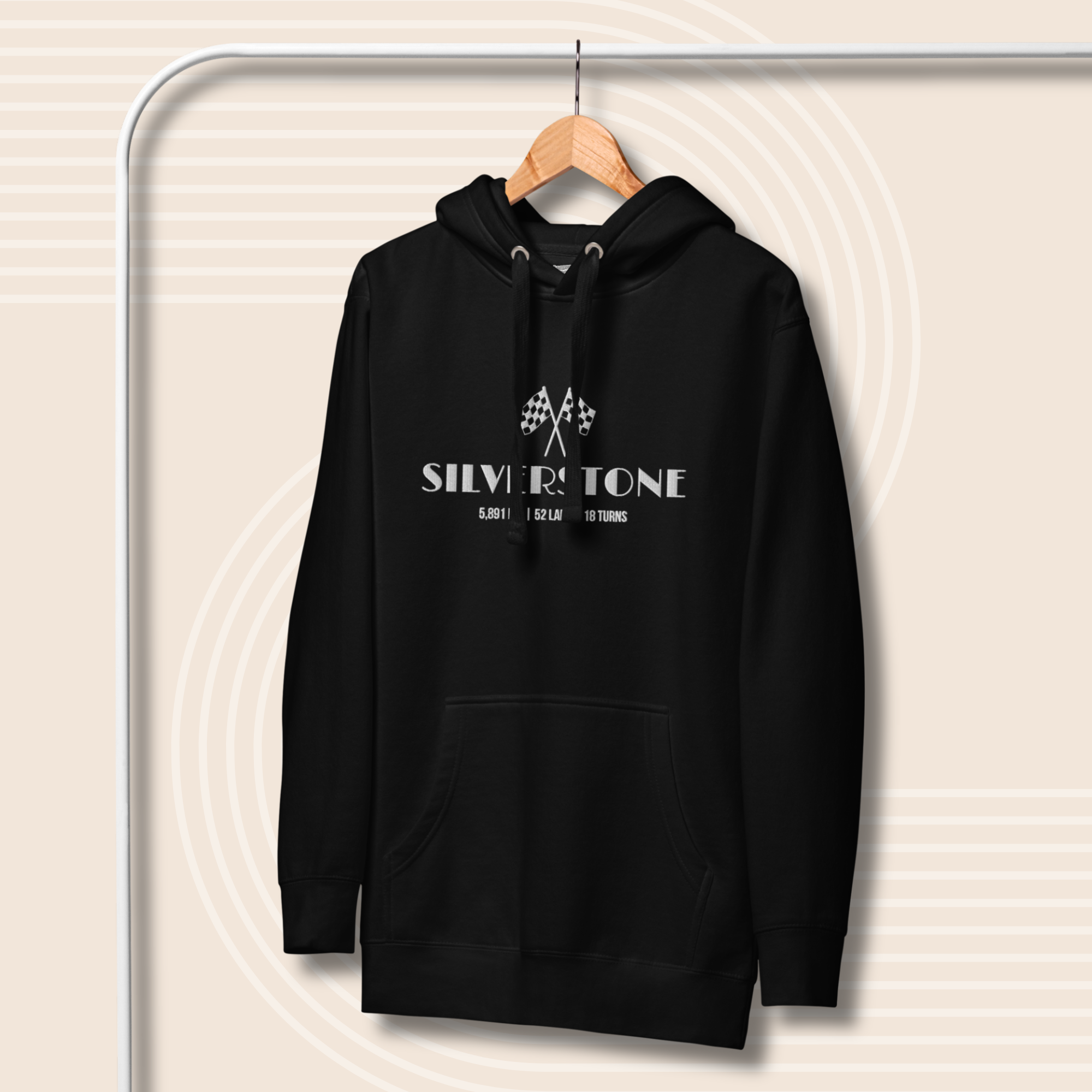 Premium embroidered Silverstone hoodie inspired by the British Grand Prix. Minimalist motorsport streetwear for racing fans and everyday wear.