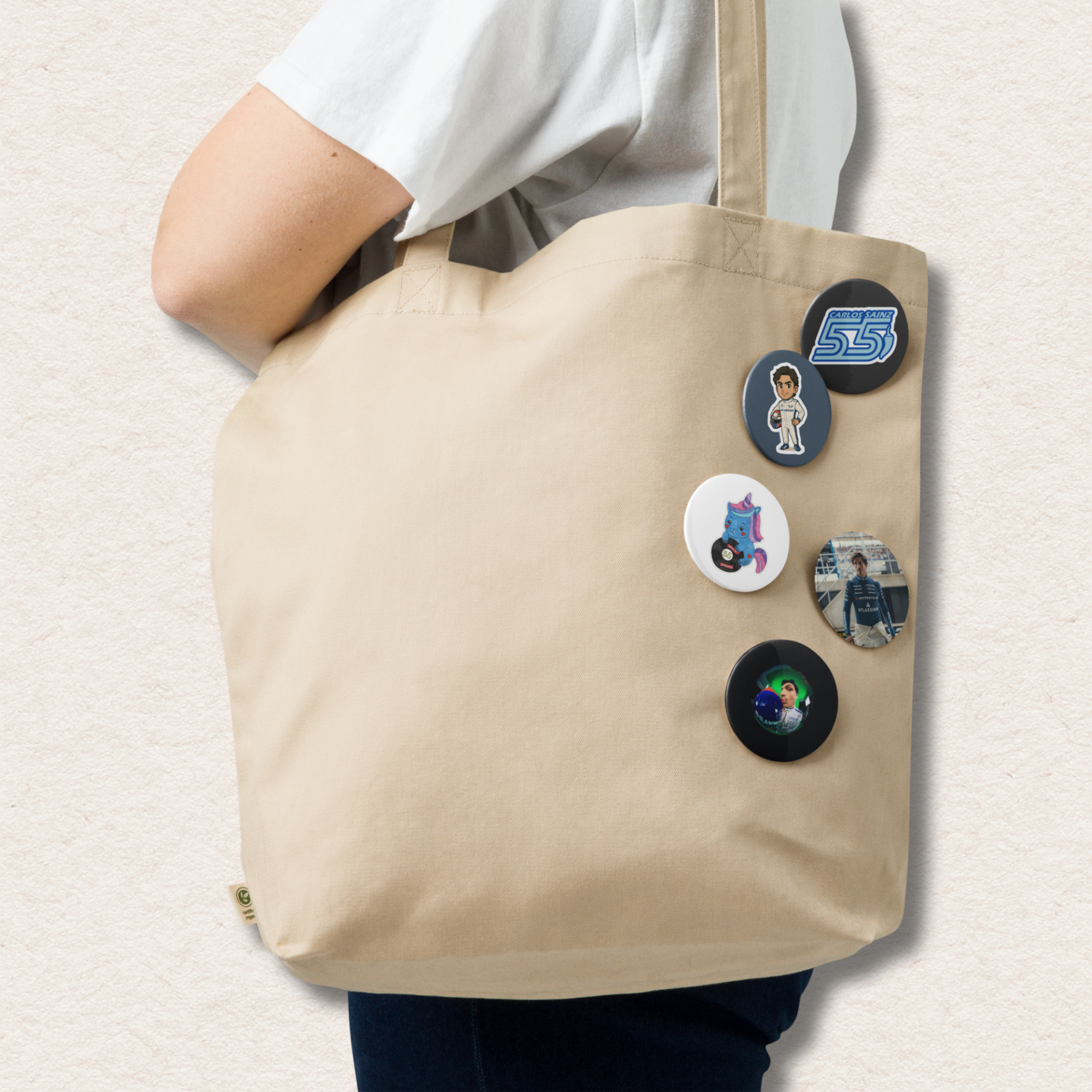 Formula 1 inspired motorsport pin button set with five racing themed designs including racing driver illustration and driver number graphic