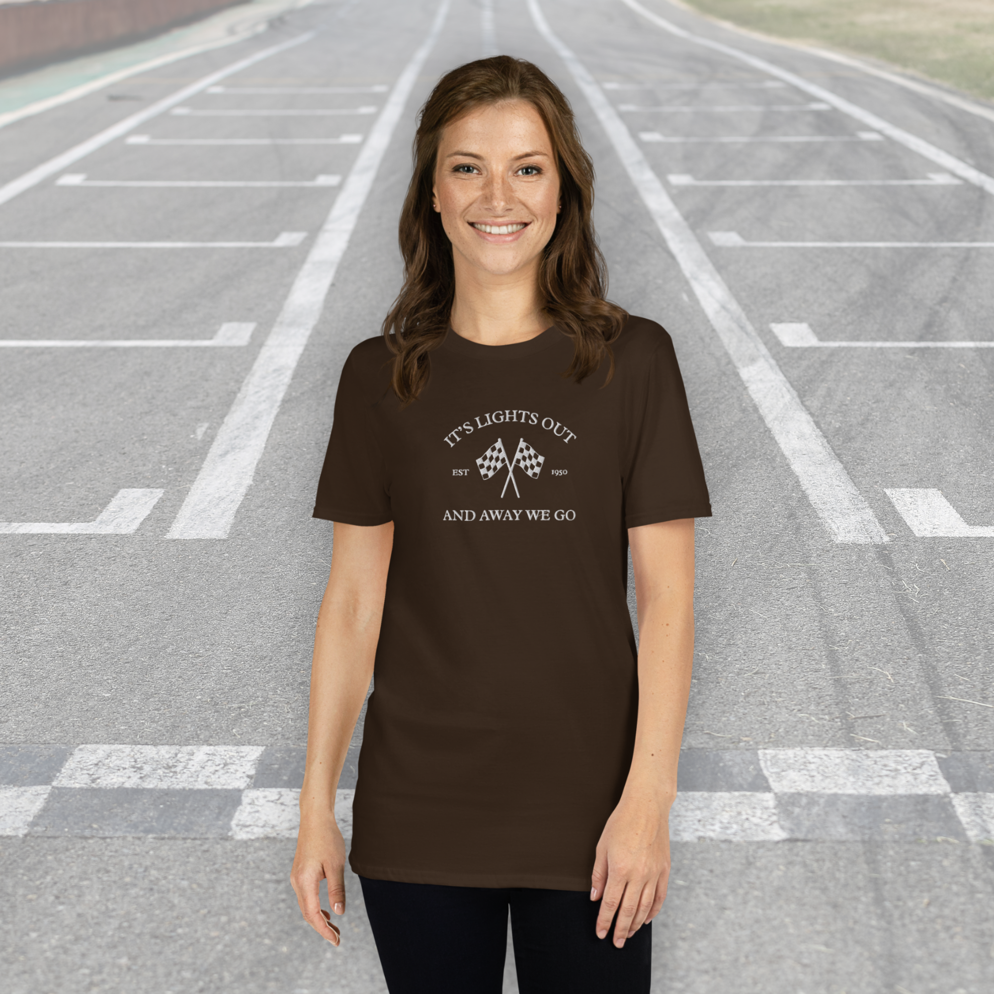 Vintage racing t-shirt featuring “It’s Lights Out and Away We Go” with checkered flags. Soft 100% cotton motorsport graphic tee for true race fans.