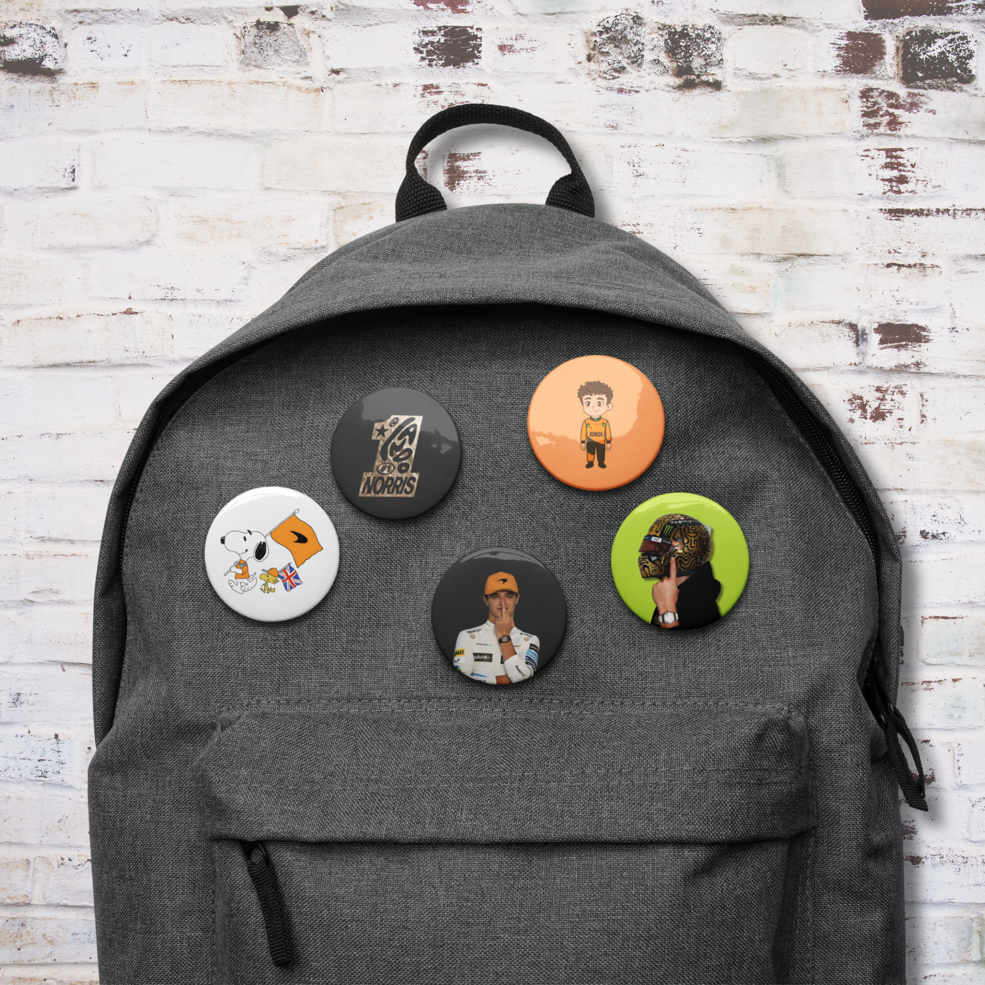 Formula 1 inspired motorsport pin button set with five racing themed designs in orange motorsport style