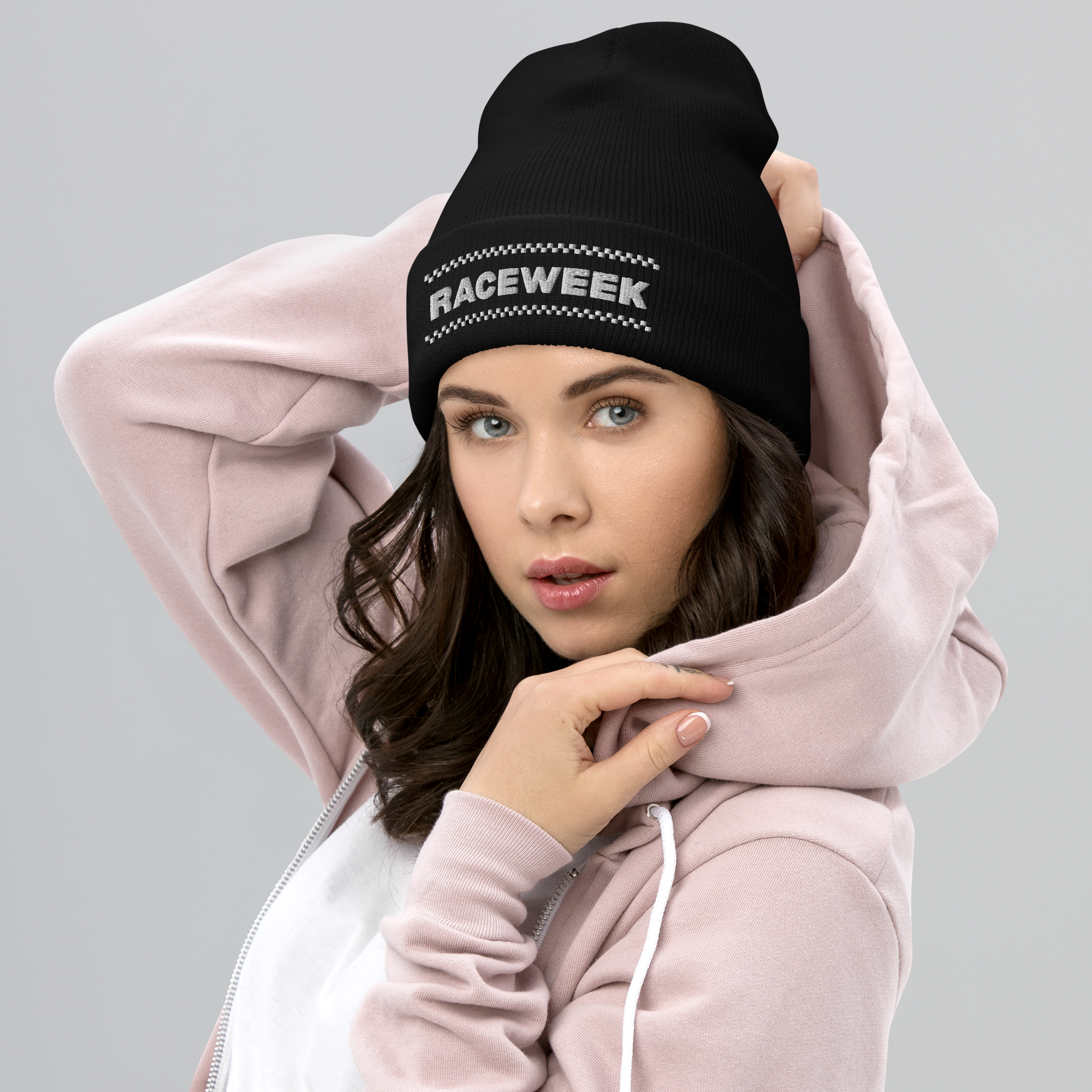 Raceweek motorsport beanie inspired by Formula 1 with checkered flag design worn by model