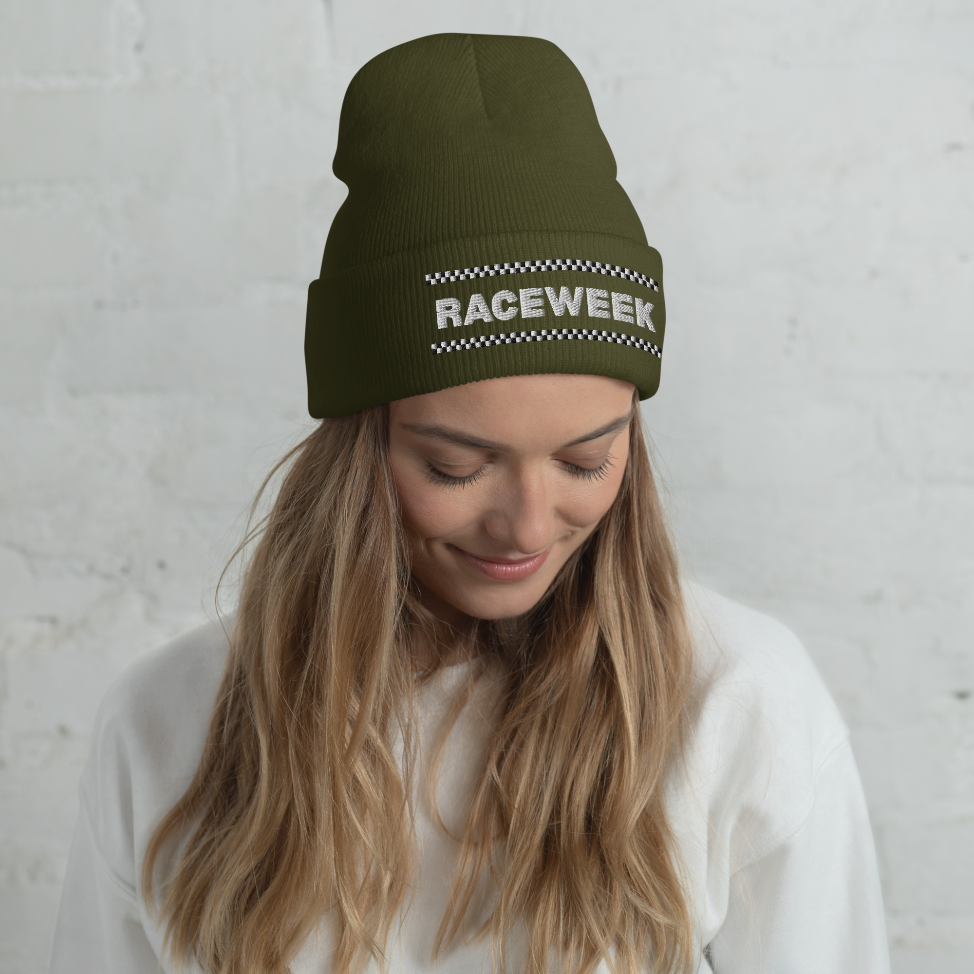 Raceweek motorsport beanie inspired by Formula 1 with checkered flag design worn by model